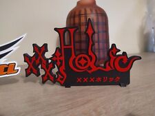 enseigne xxx holic à exposer