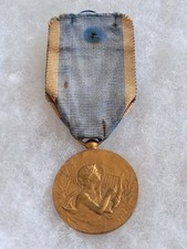 Une médaille  "  Fédération des Sociétés Musicale de L'Aisne ".