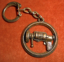 Porte-clés Métal S.A.S.S.E. St ETIENNE ancien outillage pistolet à scellement