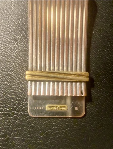Pince billet chez - à,