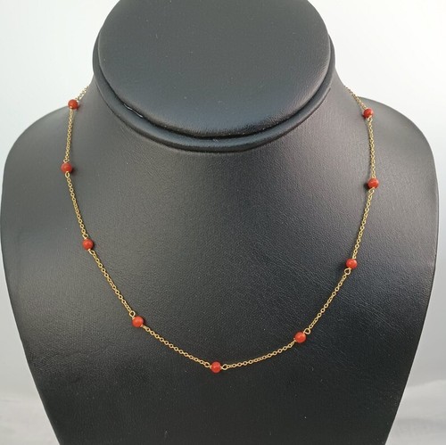 Collier station perles corail