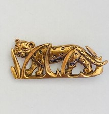 Broche en métal doré vintage