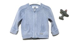 Cardigan bleu ciel plaquette siglée Dior de la maison Christian Dior, 3 mois