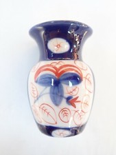 Ancien vase  en porcelaine de