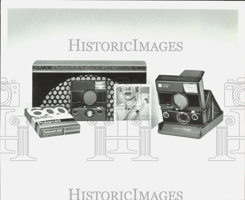Press photo polaroid new - polaroid's, slr