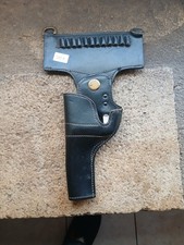 étui/Holster noir gaucher pour revolver 38 en cuir avec porte balle. TBE