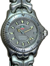 [Presque comme neuve] Montre