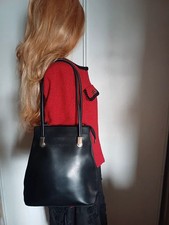 Lancaster sac multi fonctions dos et épaule