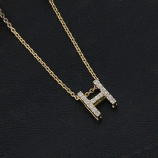 Diamant rond de 0,20 ct, finition en or jaune 14 carats avec pendentif...