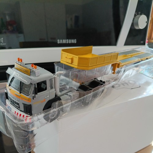 Camion porte engins - porte,
