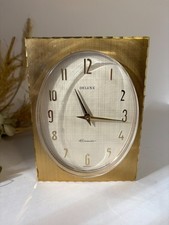 Horloge en métal doré Electromécanique à pile - DELUXE Elamatic GERMANY