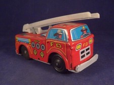 Ancien jouet tôle mécanique camion de pompier échelle montante JAPAN Années 60