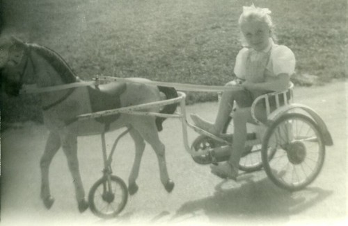 France girl riding pedal horse - france,