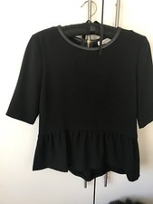 Haut noir Sandro peplum avec bordure en cuir (taille 1)