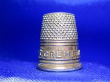 dé a coudre publicitaire en laiton  " Ecrémeuse VELOX "