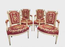 Quatre fauteuils peints