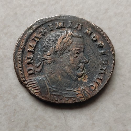 Follis maximianus genio - de,