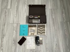 ordinateur de poche SHARP PC 1251 avec unité CE-125 imprimante,lecteur micro K7