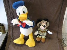 2 peluches Disney 1 grande Donald articulée et petite Minnie Safari Disneyland