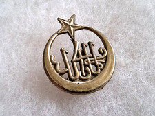 Un insigne militaire " 4ème