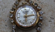 Ancienne montre FEMME mécanique  MARQUE:  MILLIONAIRE DE LUXE  ANTIMAGNETIC.