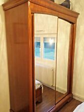 Grande armoire portes coulissantes miroir