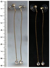 BOUCLES D’OREILLES, pendentif chaine et brillant