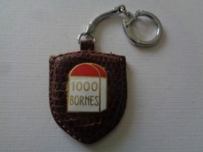 ANCIEN PORTE CLE CUIR METAL EMAILLE  1000 BORNES  JEU