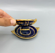 Tasse et soucoupe miniature Napoléon porcelaine Limoges France décor bleu or