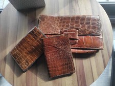 Lot de 3 pochettes en cuir de