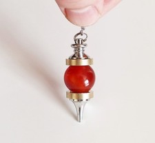 *° PENDULE MICRO VIBRATOIRE