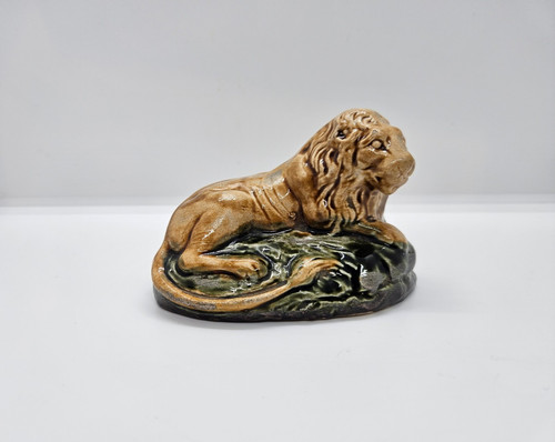 Antique sitting lion - sitting,