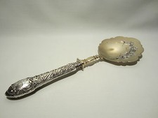 ANCIENNE CUILLERE PELLE A