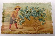 CPA Fantaisie gaufrée - Bonne Année - Enfant Brouette Fleurs