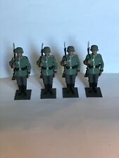 LOT DE 4 SOLDATS EN PLOMB