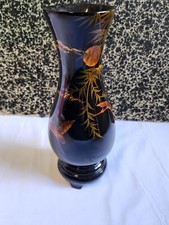 Superbe vase noir en bois