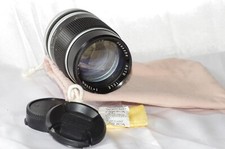 Télé objectif compact Canon FD 135mm f2,8 PANAGOR, avec bouchons et housse, TBE