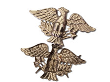 Insigne en métal embouti