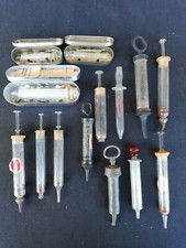 Lot 14 seringues anciennes en