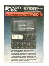Sharp ZQ-1250A Avec Petit Défaut / Electronic Organizer / Agenda Electronique 