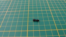 Attache capot pièce miniature