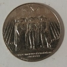 P1) une pièce de 1 franc 1989