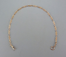 Belle châtelaine de montre gousset plaqué or, 40 cm, de la marque SUROR.