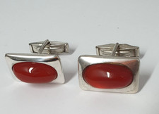 Boutons de manchettes argent