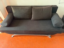 canapé lit convertible, noir. Coussins dossiers et accoudoirs 