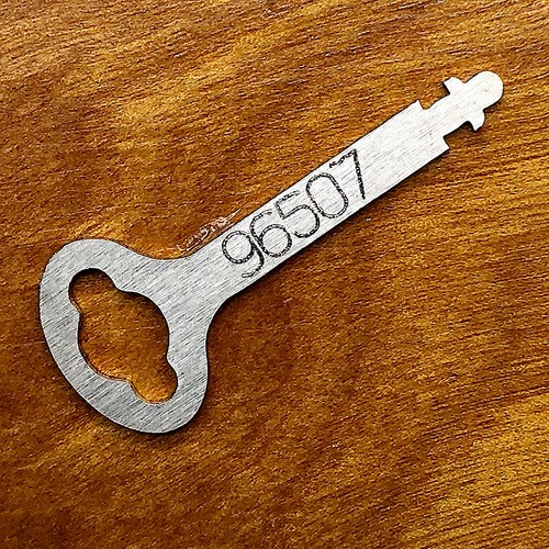 Clé plate pour - , machine