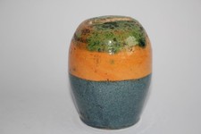 Tirelire à casser terre