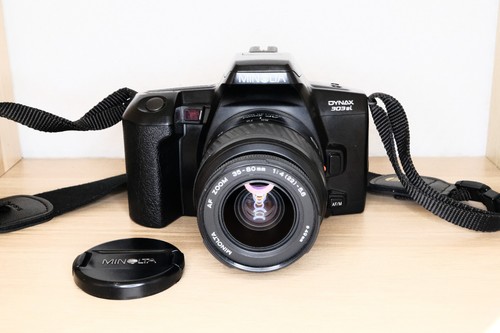 Minolta dynax 303 with zoom - dynax,