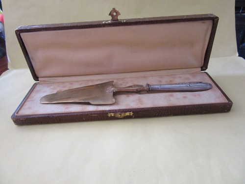 Pelle tarte argent fourre - pelle,
