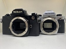 Lot de 2 Nikon FM 35mm Appareil Photo Argentique 1 Noir et 1 Chromé (Boîtier Nu)